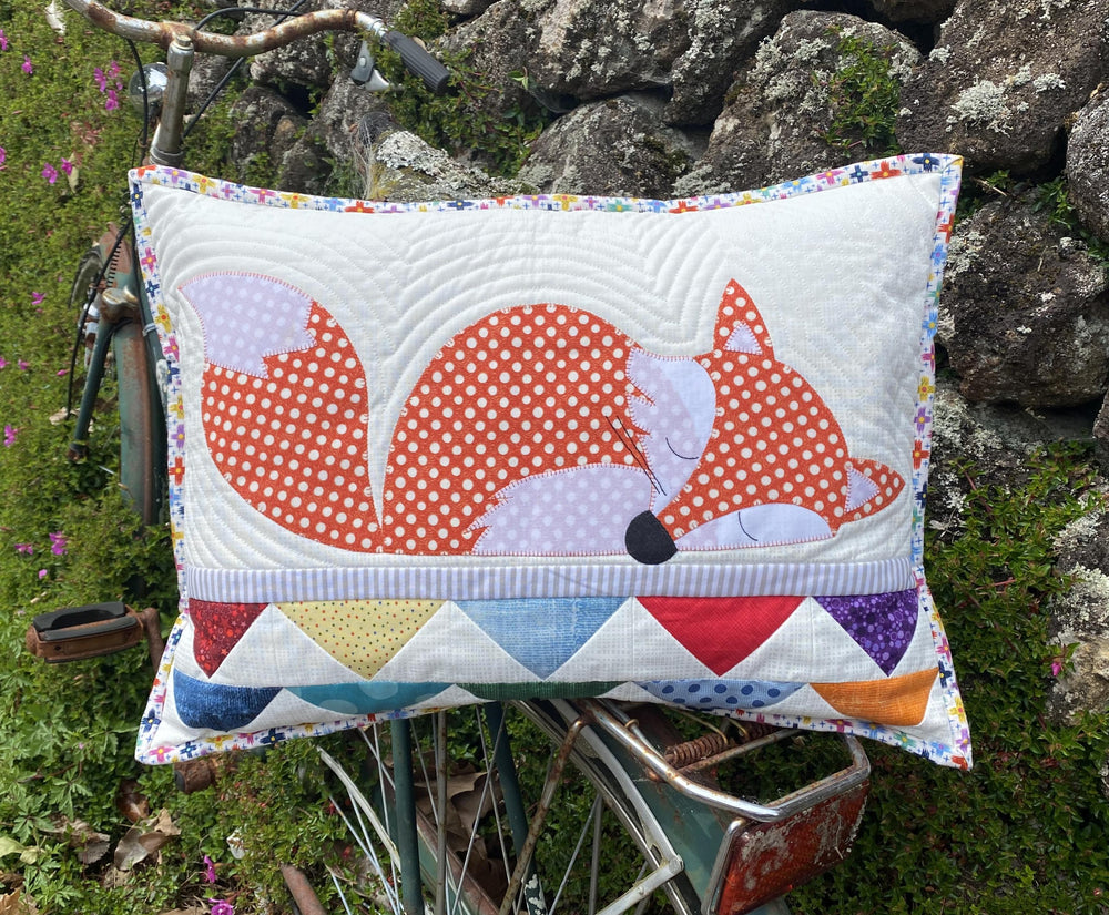 Foxies Cushion designed by Claire Turpin, featuring a whimsical fox applique pattern