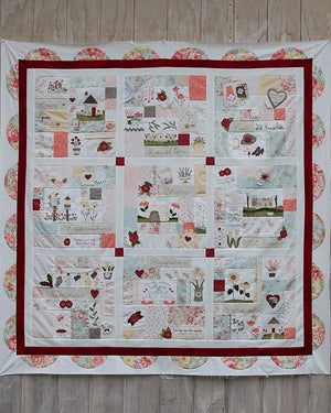 
                  
                    Handmade Friendship Quilt featuring piecing, stitchery, applique, and embellishments by Libby Richardson
                  
                