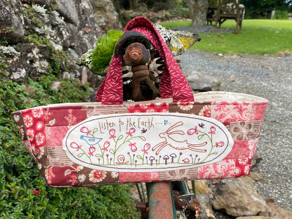 DIY quilted project bag for storing sewing tools and rotary cutters