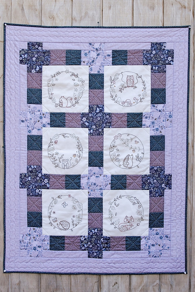 The Country Yard Forest Friends Quilt – Monthly quilting project with woodland-themed fabric and patterns.